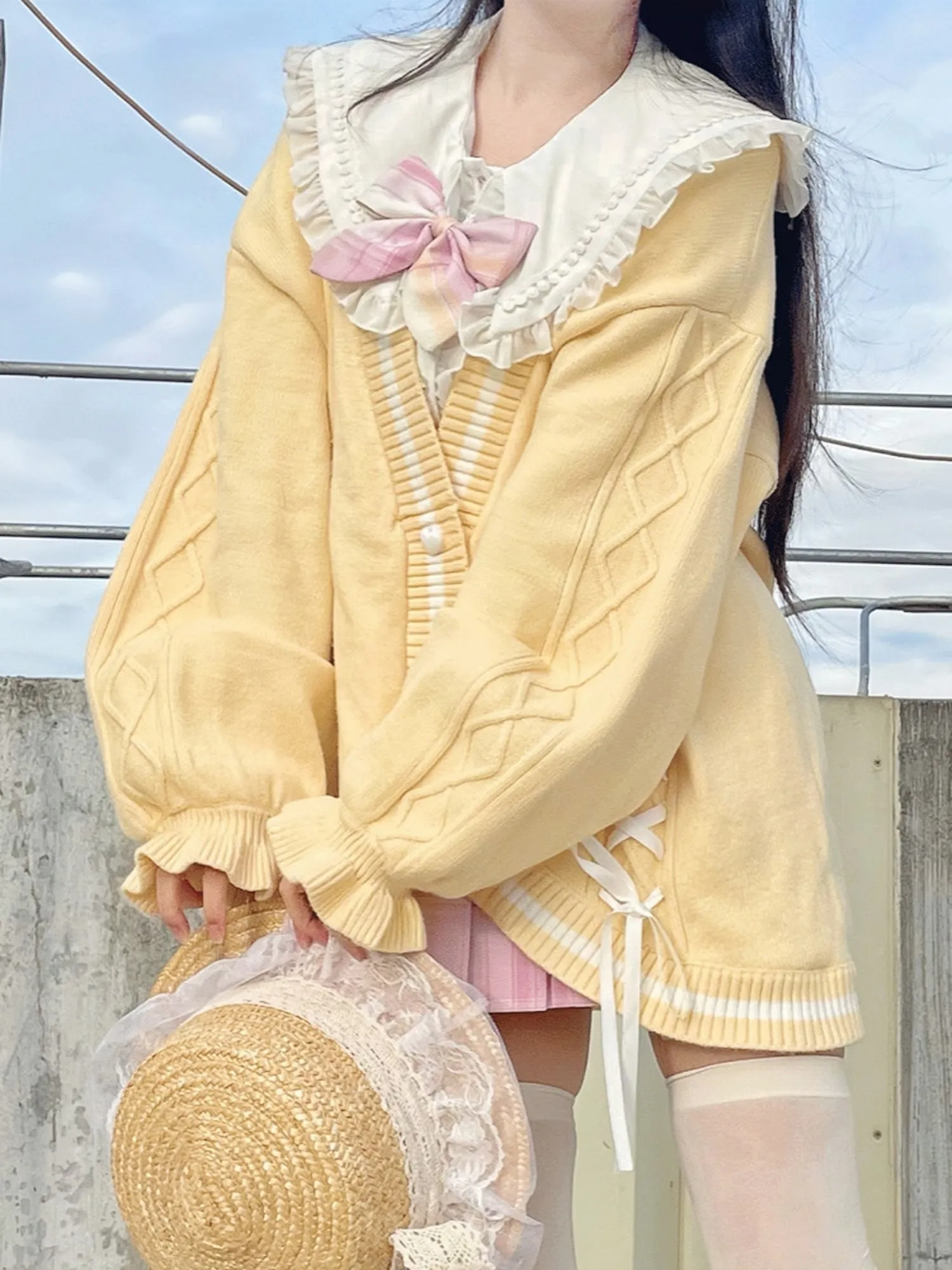 Seal Release Knit Bow Cardigan