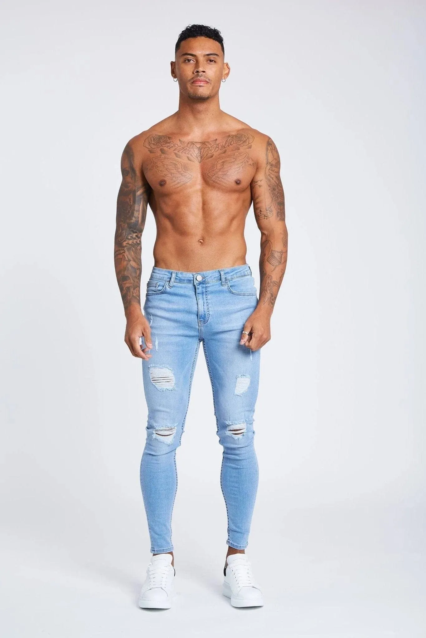 SKINNY FIT JEANS RIPPED AND REPAIRED - LIGHT BLUE